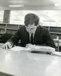 Male student studying in Canisius Hall (Library)