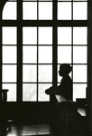 Silhouette of student in McAuliffe Chapel