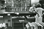 Student at the circulation desk in Nyselius Library