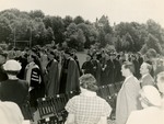 Guests standing for academic processional
