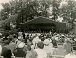 Seated guests and bandstand during Commencement 1951