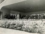 Rev. James H. Dolan, S.J. at podium